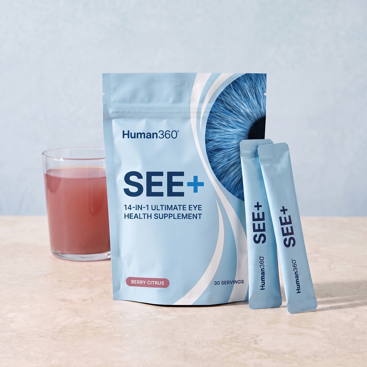 SEE+ pouch with matching daily sachets and a berry-colored drink.