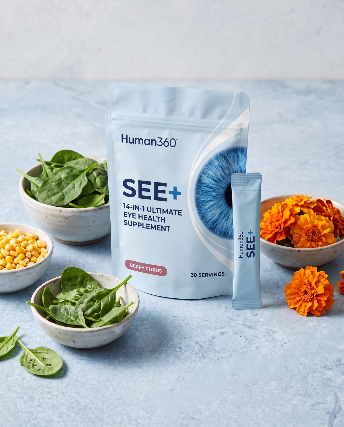 Illustrative SEE+ product still life with leafy greens, corn and marigold flowers.